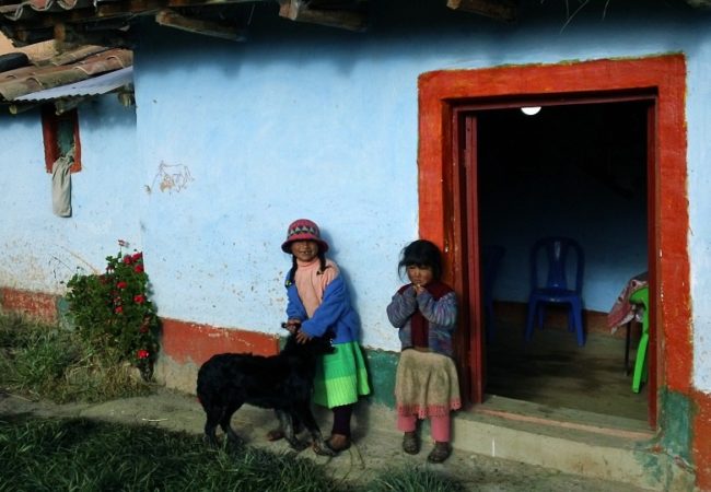 children outside house in bolivia